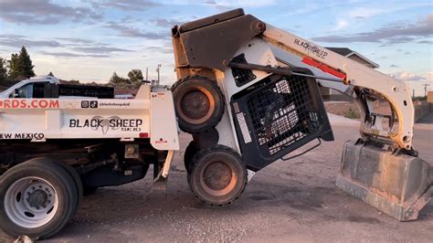 load skid steer into truck|how to drive skid steer loader.